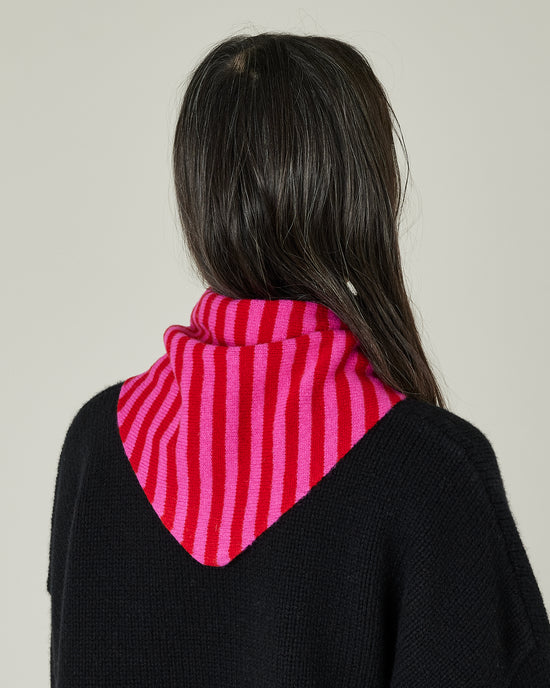 model wears pink and red stripe knitted neckerchief