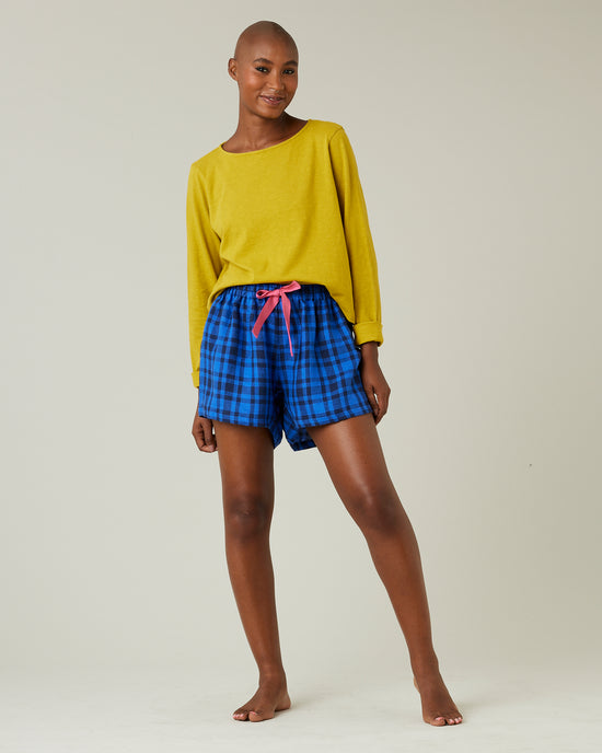 model wears indigo check bed shorts