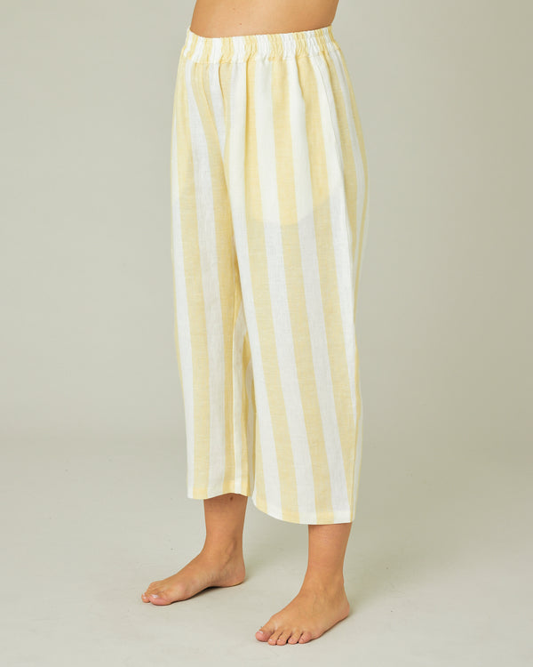 pregnant model wears lemon stripe ultimate pj bottoms left