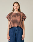 model wears biscuit stripe linen polly top 