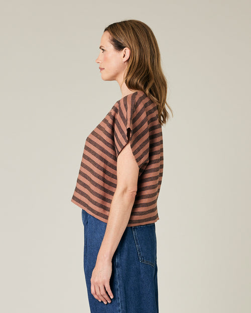 model wears biscuit stripe linen polly top 