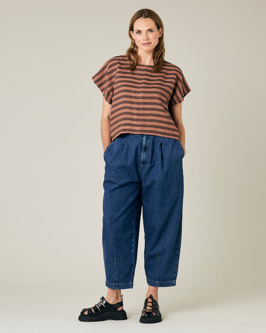 model wears biscuit stripe linen polly top 