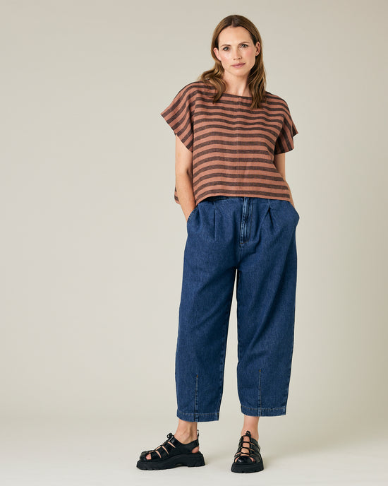 model wears biscuit stripe linen polly top 