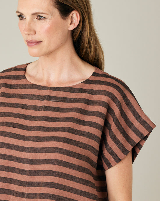 model wears biscuit stripe linen polly top 