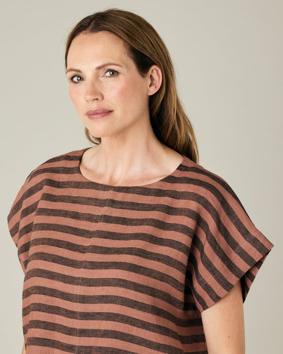 model wears biscuit stripe linen polly top 