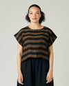 model wears rust stripe linen polly top