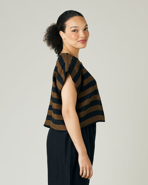  model wears rust stripe linen polly top