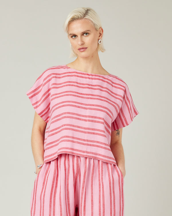 model wears blossom stripe linen polly top