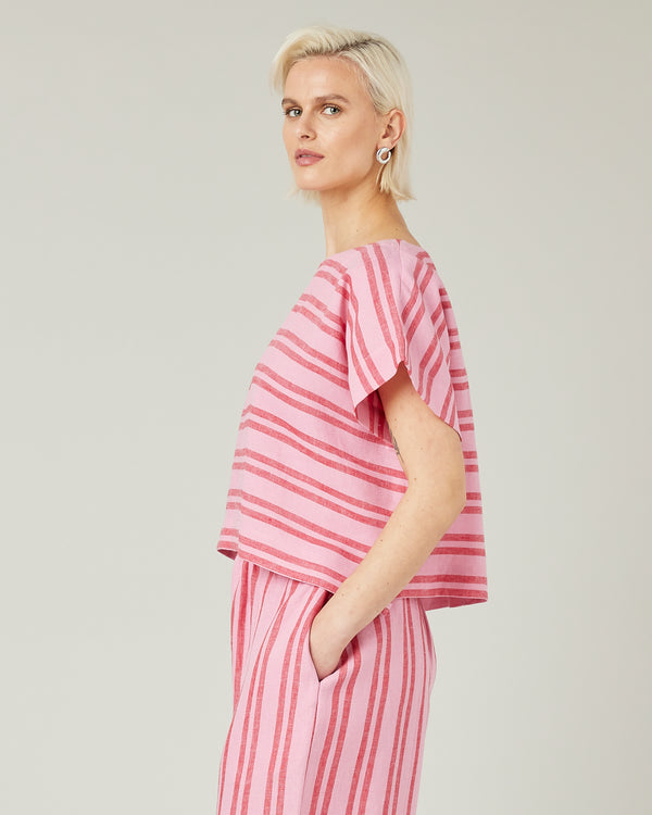 model wears blossom stripe linen polly top