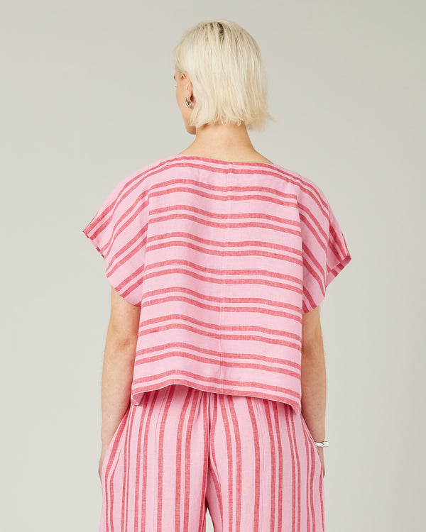 model wears blossom stripe linen polly top