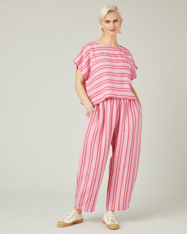 model wears blossom stripe linen polly top