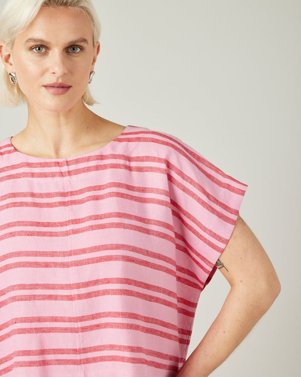 model wears blossom stripe linen polly top