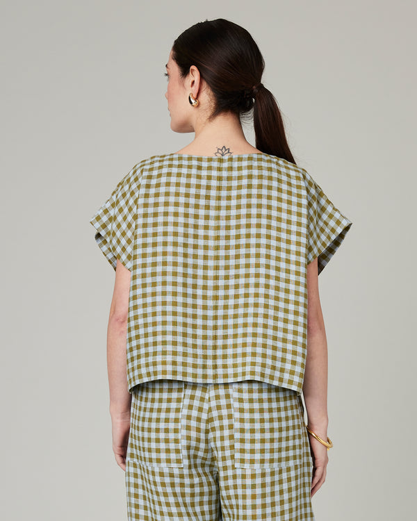 model wears meadow check linen polly top