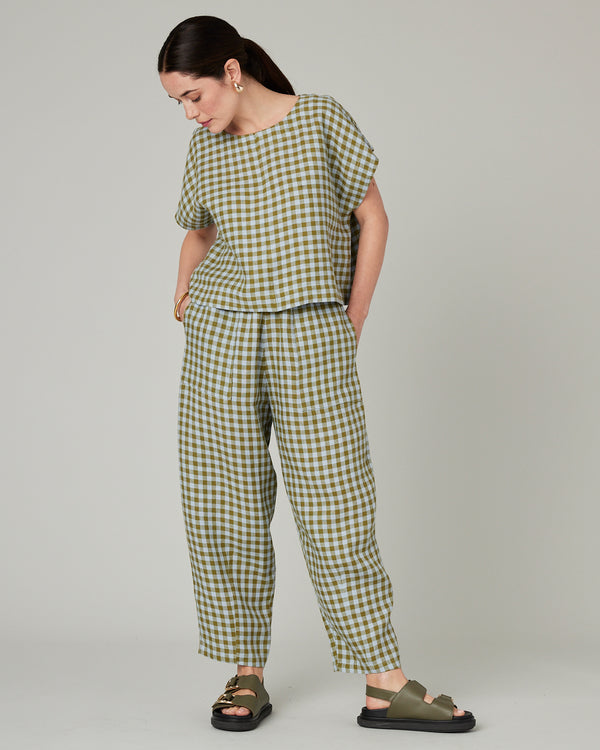 model wears meadow check linen polly top