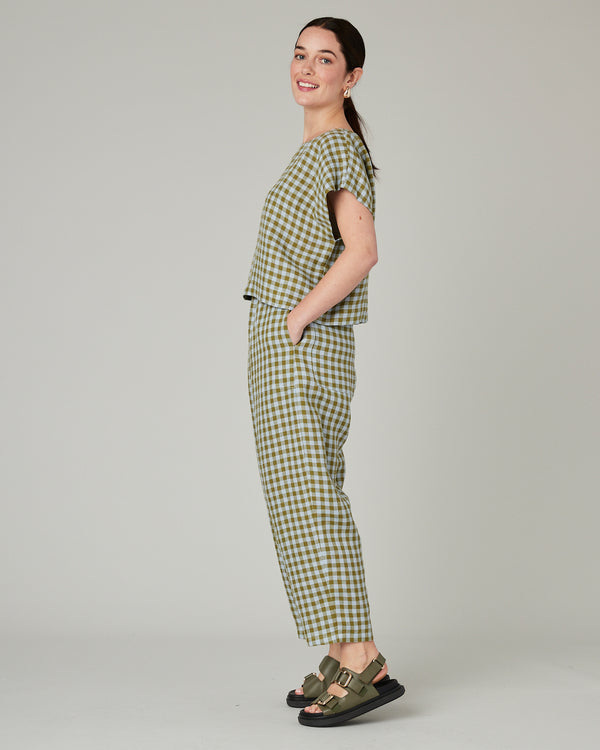 model wears meadow check linen polly top
