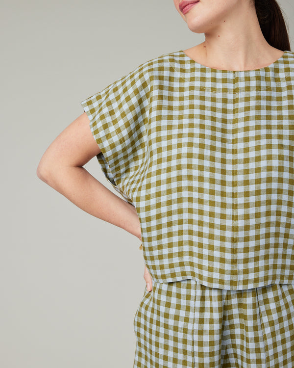 model wears meadow check linen polly top