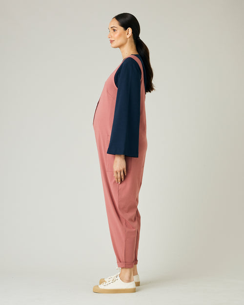 pregnant model wears dusty pink jersey poppy jumpsuit