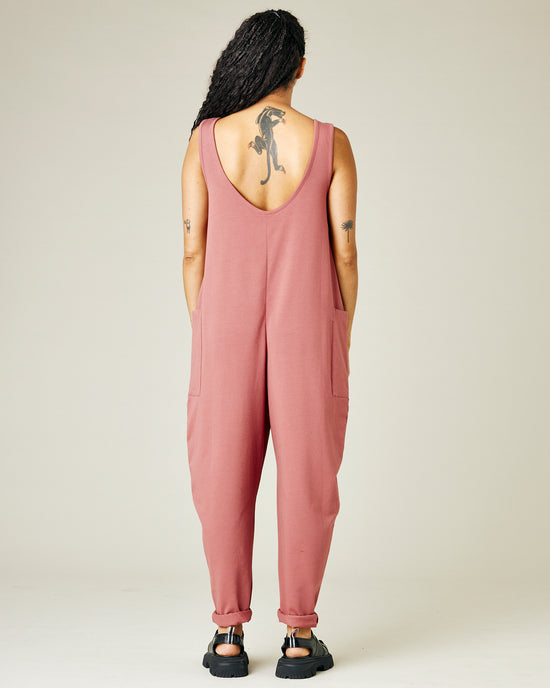 model wears dusty pink jersey poppy jumpsuit