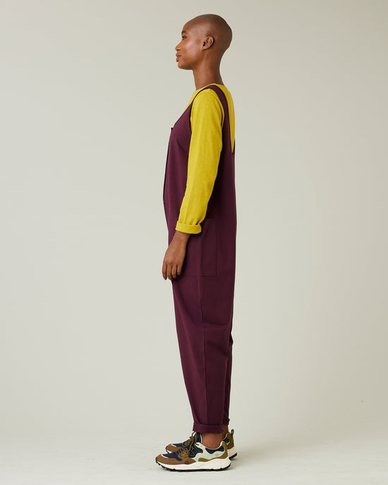 model wears wine cotton jersey poppy jumpsuit