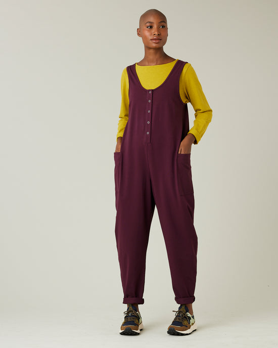 model wears wine cotton jersey poppy jumpsuit