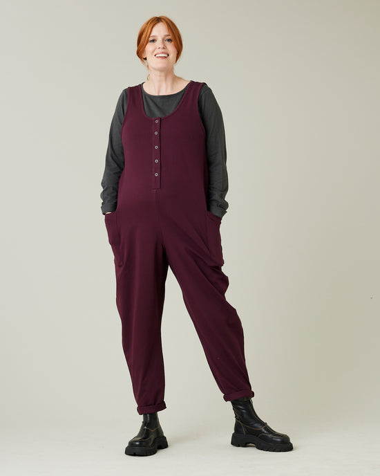 pregnant model wears wine cotton jersey poppy jumpsuit