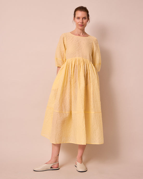 model wears prue butter organza dress