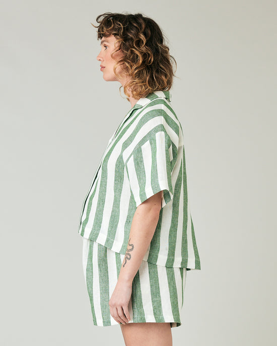 pregnant model wears clover stripe linen ultimate pj top