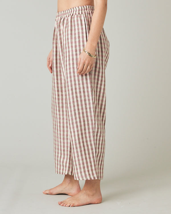model wears neapolitan check linen ultimate pj trousers left