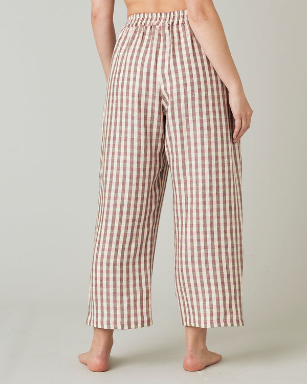 model wears neapolitan check linen ultimate pj trousers back