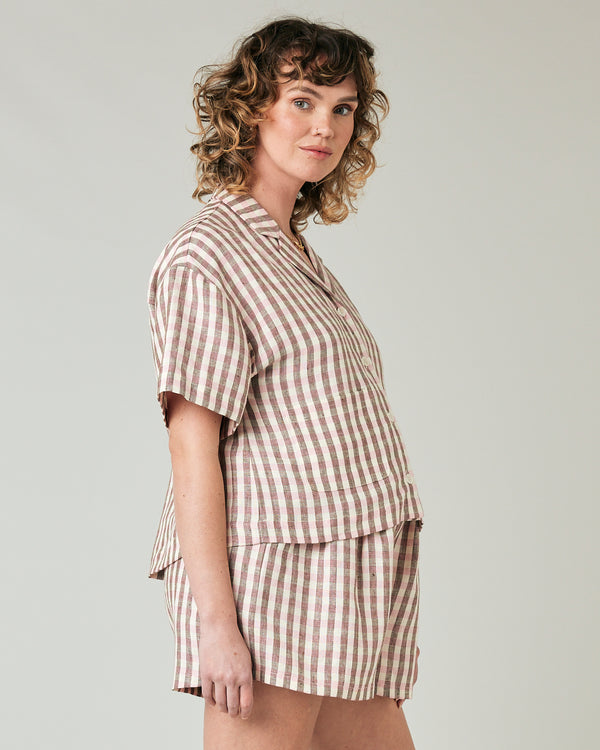 pregnant model wears neapolitan check linen ultimate pj top