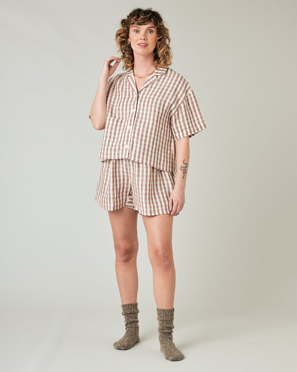 pregnant model wears neapolitan check linen ultimate pj top