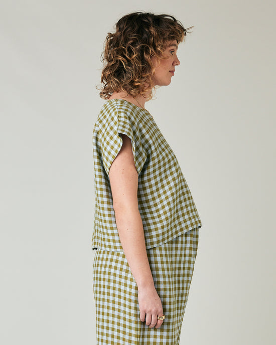 pregnant model wears meadow check linen polly top