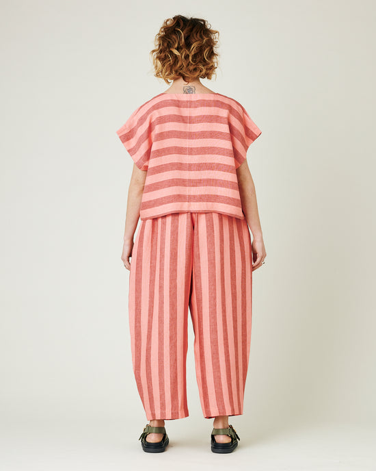 model wears blush stripe mabel trousers