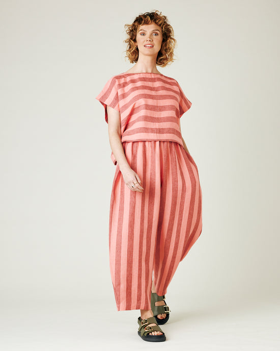 model wears blush stripe mabel trousers