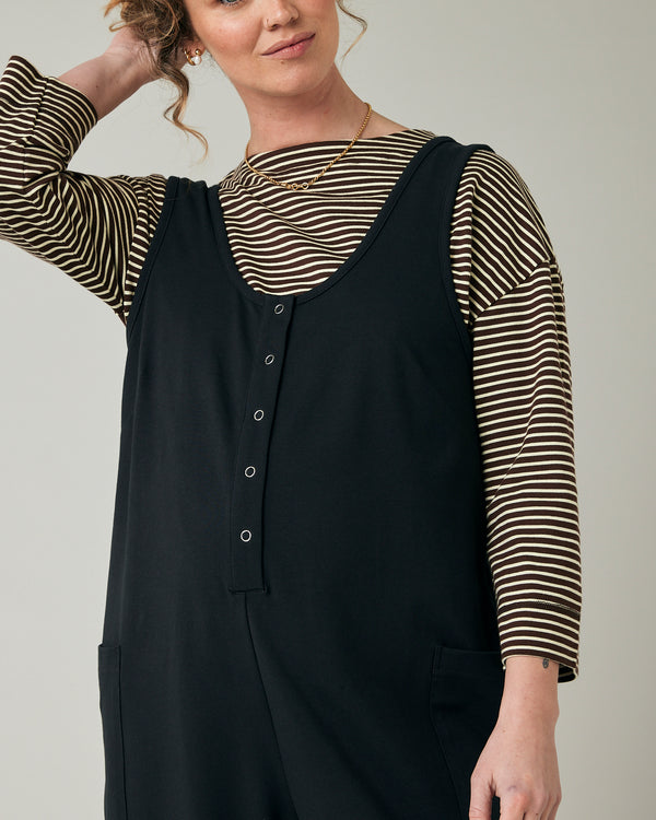 pregnant model wears slate jersey poppy jumpsuit