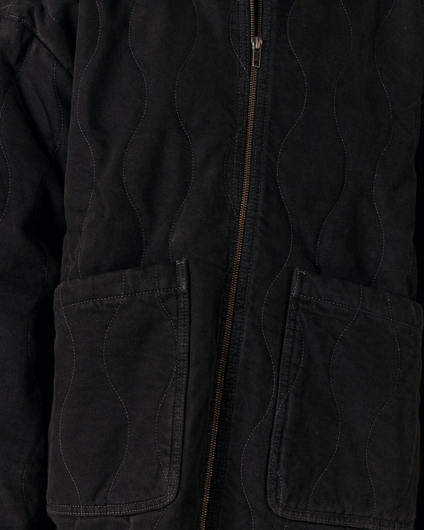 model wears raya black denim jacket