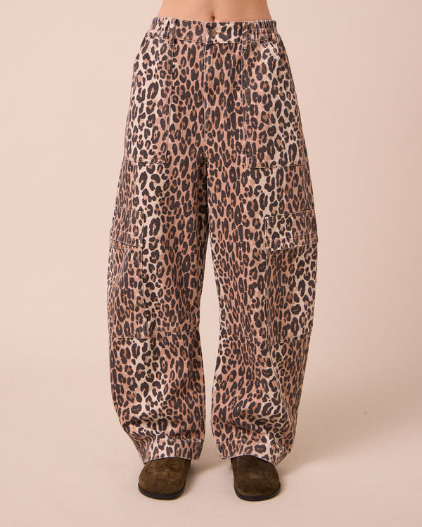 model wears reba leopard print denim jeans front