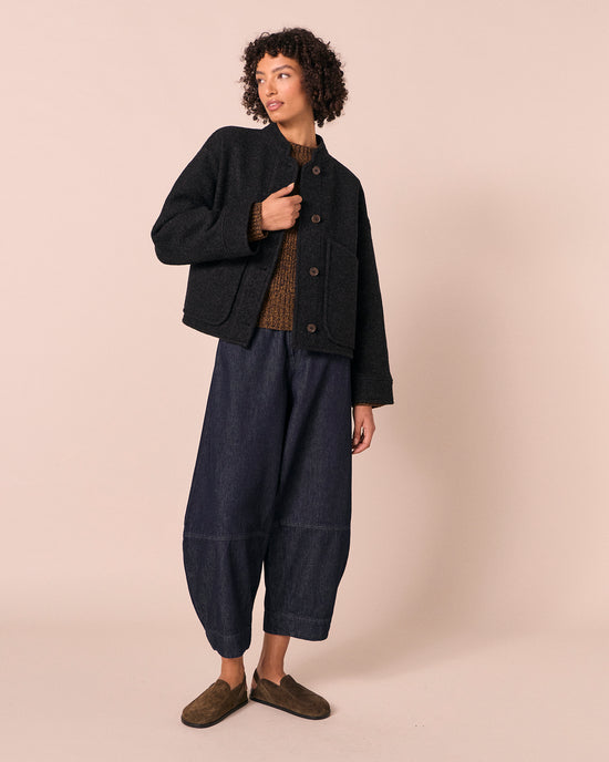 model wears reese black boiled wool jacket