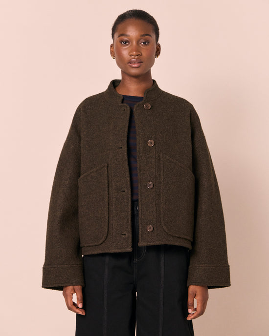 model wears reese dark fern boiled wool jacket