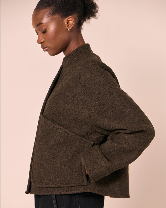 model wears reese dark fern boiled wool jacket