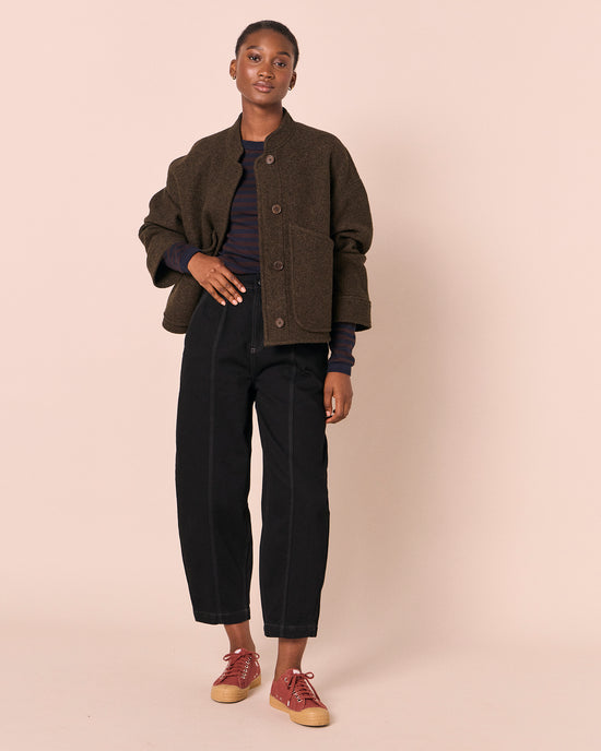 model wears reese dark fern boiled wool jacket