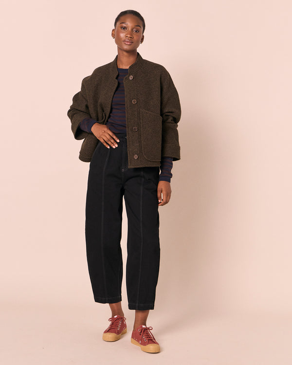 model wears reese dark fern boiled wool jacket