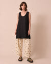 model wears reeta black linen dress