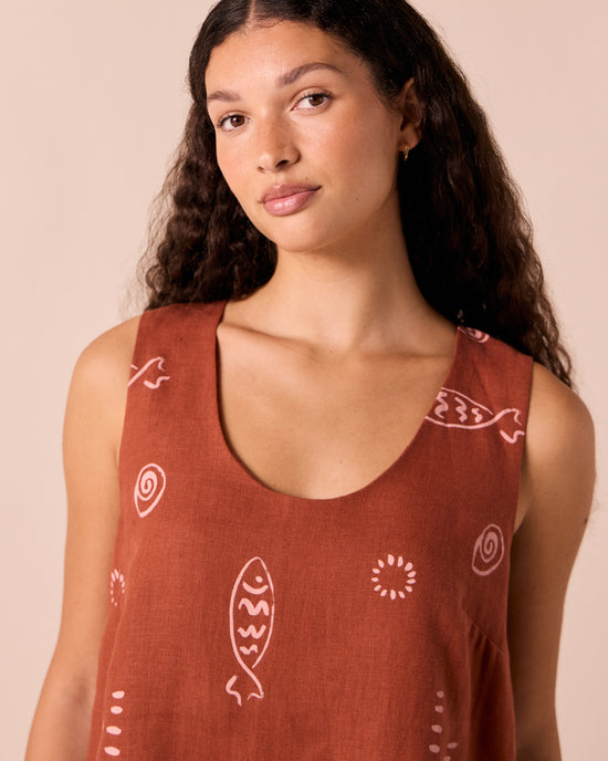 model wears reeta beachcomber print linen dress