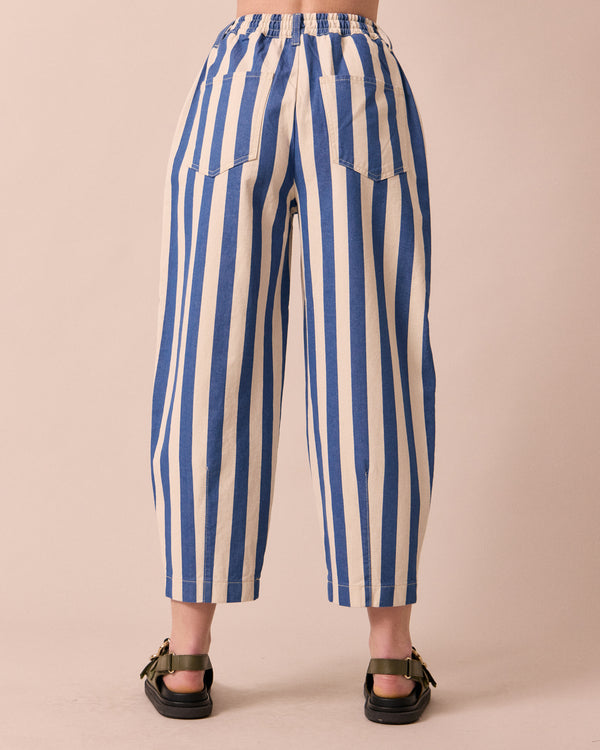 model wears remi ocean stripe denim jeans back