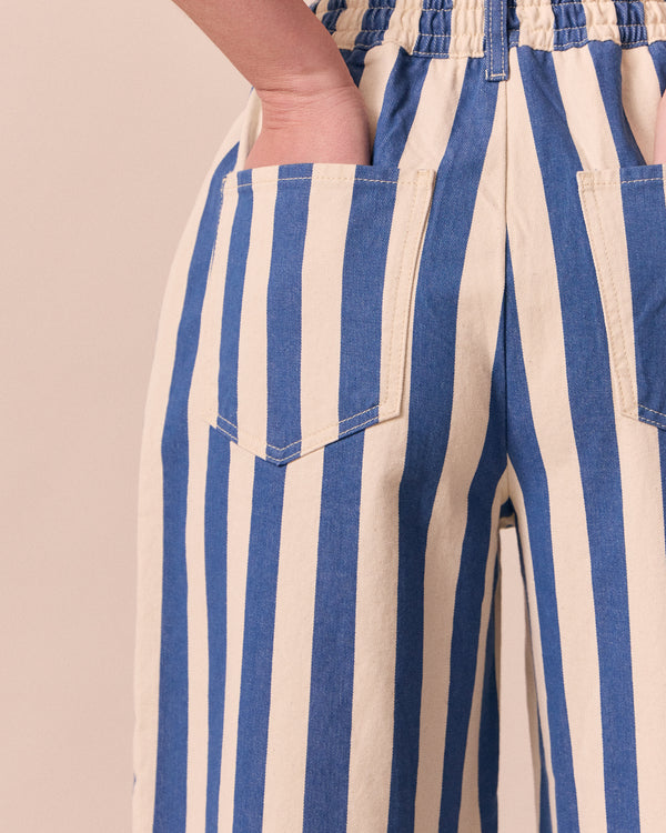 model wears remi ocean stripe denim jeans
