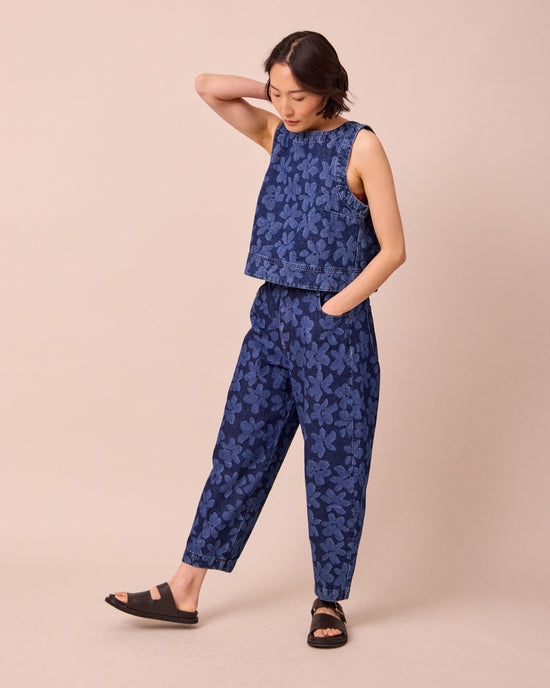 model wears remi pressed flower print denim jeans right