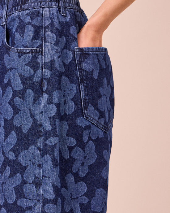 model wears remi pressed flower print denim jeans