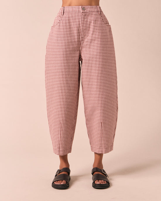 model wears remi taffy mini gingham denim jeans front