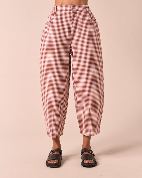 model wears remi taffy mini gingham denim jeans front